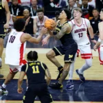 Michigan jumps out quick, dismantles Arizona, 91-73